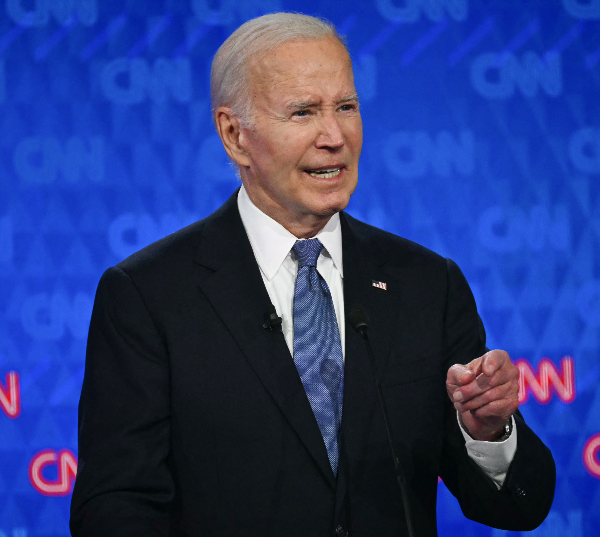 President Joe Biden gestures while speaking