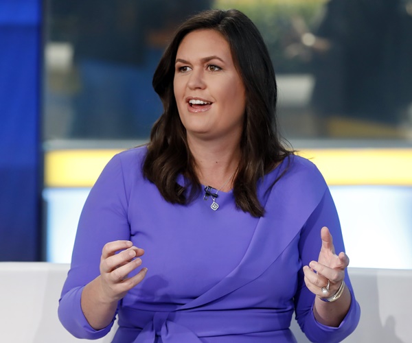 sarah sanders speaks on a tv set.