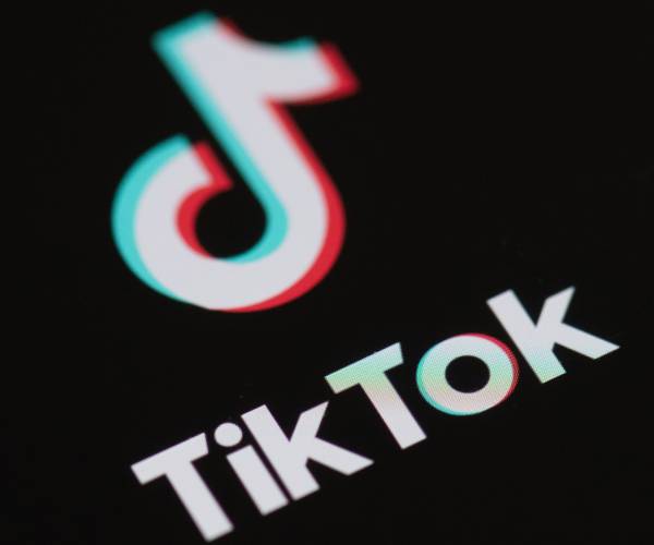 a tiktok logo on a smartphone screen