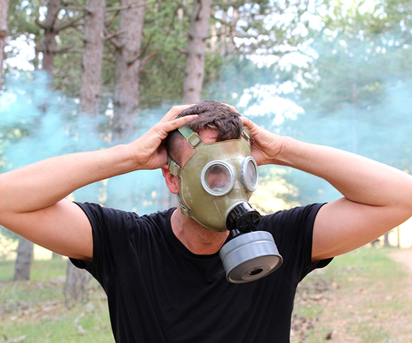 climate panic and guilt behind a gas mask