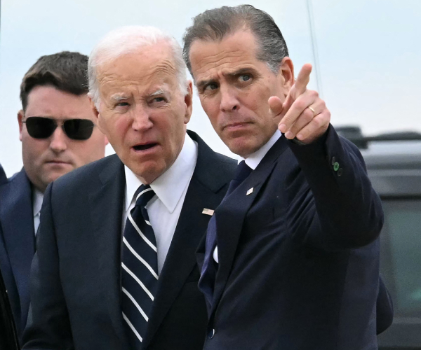 joe and hunter biden with a secret service agent speaking outside the presidential limo