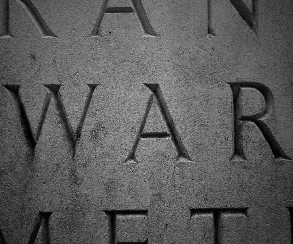 the word war etched in granite