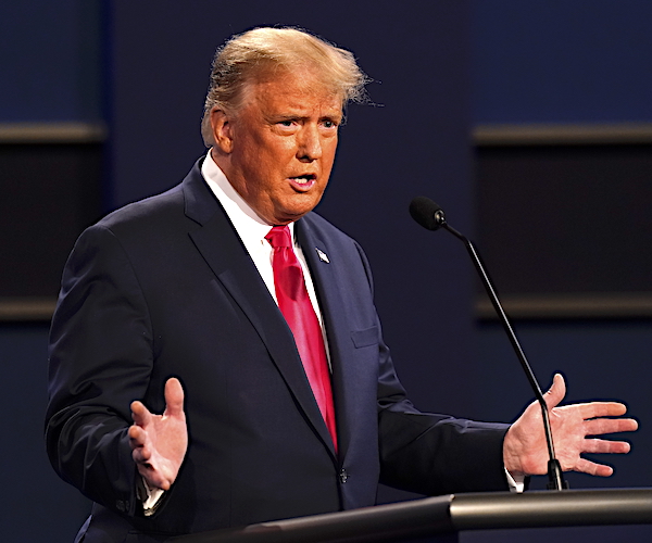 president donald trump reacts as he speaks during the second and final presidential debate