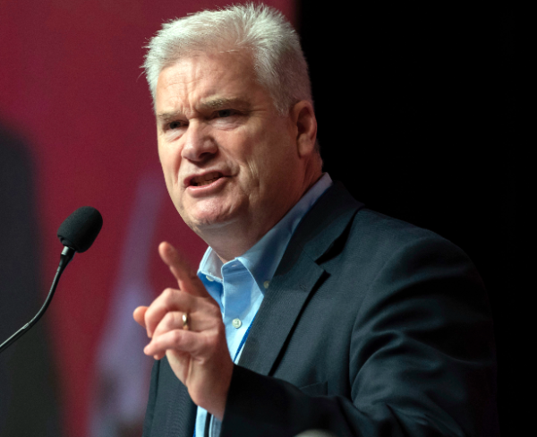 Tom Emmer gestures while speaking