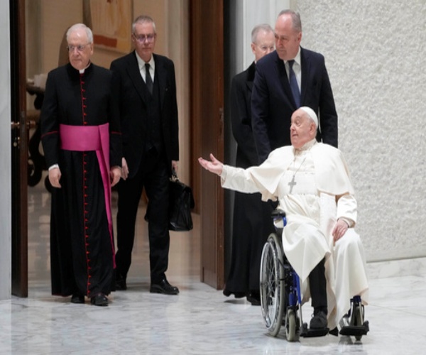 Pope Francis in a wheelchair