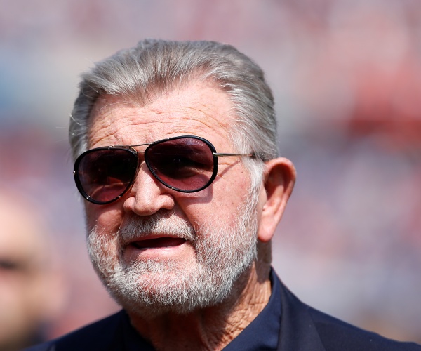 ditka wearing sunglasses and a navy blue shirt