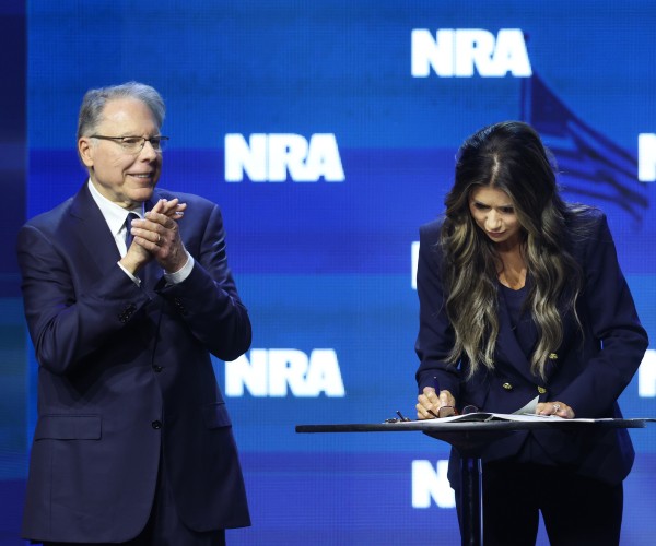 wayne lapierre of nra and gov kristi noem republican of south dakota 