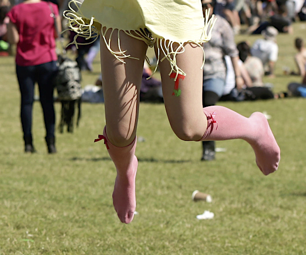 A young girl jumps high in the air in an osteoporosis study