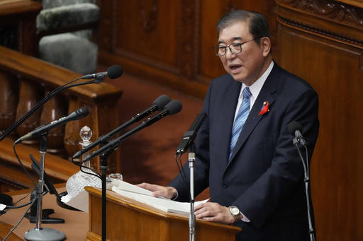 Japan's New Leader Expresses Regret for Governing Party Slush Fund Scandal, Vows Stronger Defense