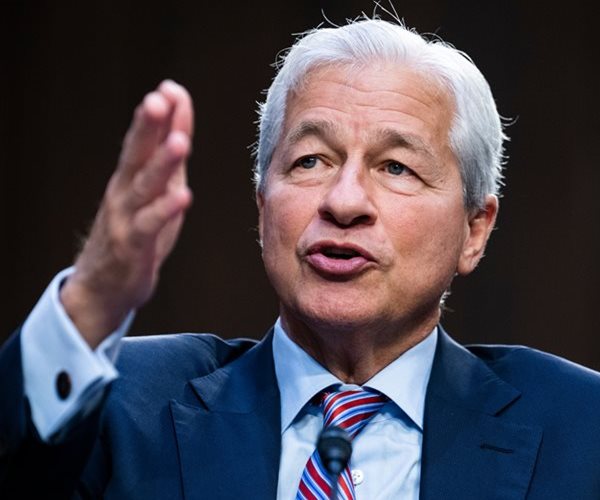 Jamie Dimon gestures while speaking