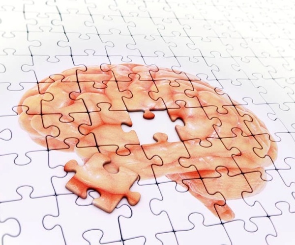 puzzle of brain with one piece missing