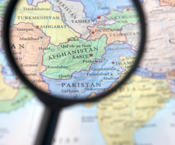 afghanistan on a map, seen through a magnifying glass