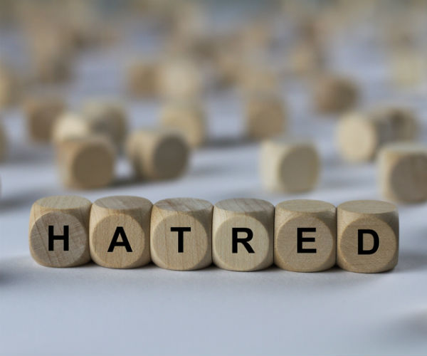 hatred in wooden blocks lettering 