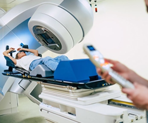 woman undergoing radiation therapy