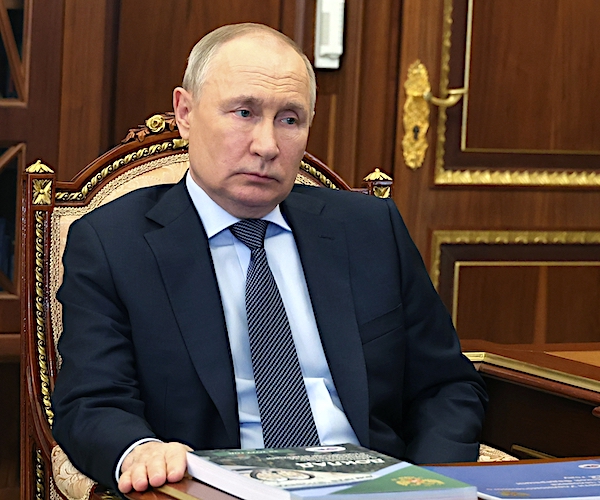 Vladimir Putin sitting