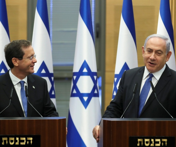 benjamin netanyahu delivers a statement with isaac herzog
