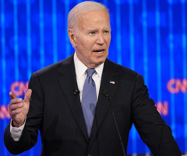 President Joe Biden gestures while speaking