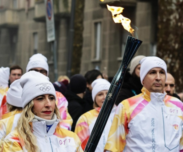 Olympic Torch Arrives in Milan to Cheers and Protests