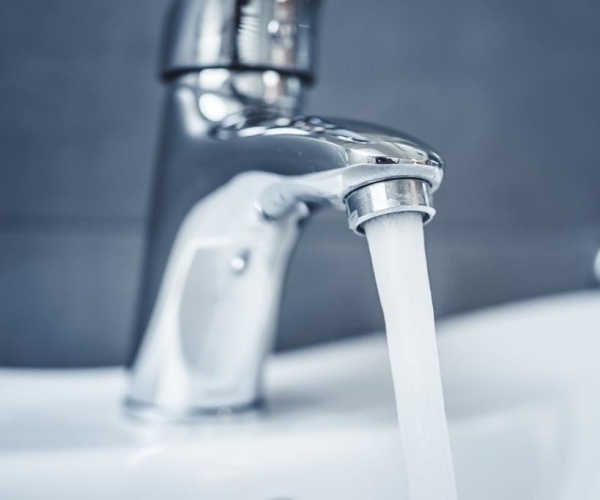 faucet with water coming out of it