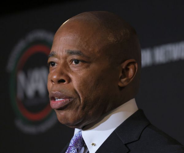 Eric Adams Calls for Faster Work Permits for NYC Migrants