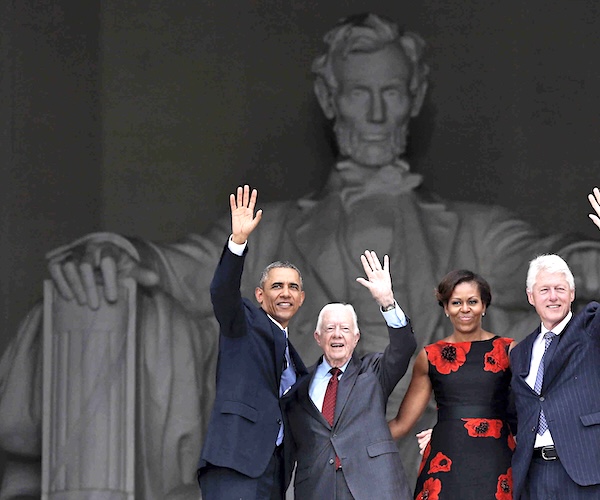 barack and michelle obama and jimmy carter wave