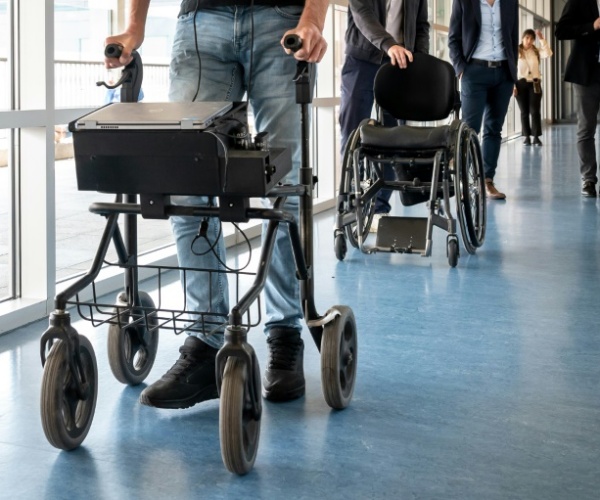 patient walking with walker during study