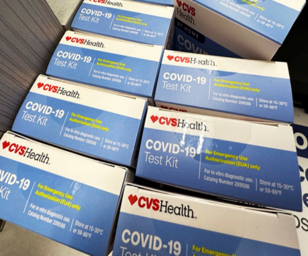 boxes of COVID tests that will be mailed 