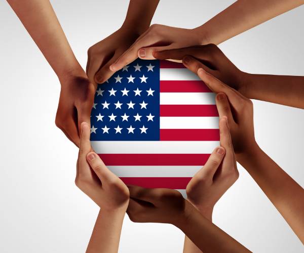 a group of hands forming a circle with an american flag inside