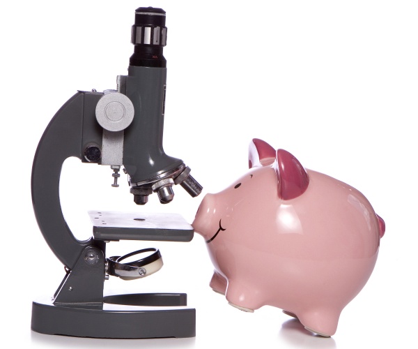 microscope and piggy bank