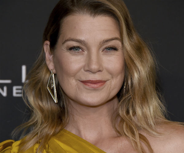 ellen pompeo is seen in a gold one-shoulder dress