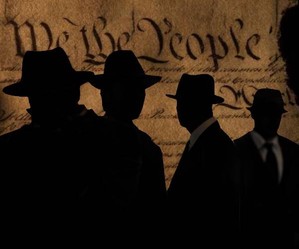 a group of shadowy spies in front of the constitution