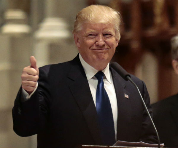 trump smiling and giving the thumbs up