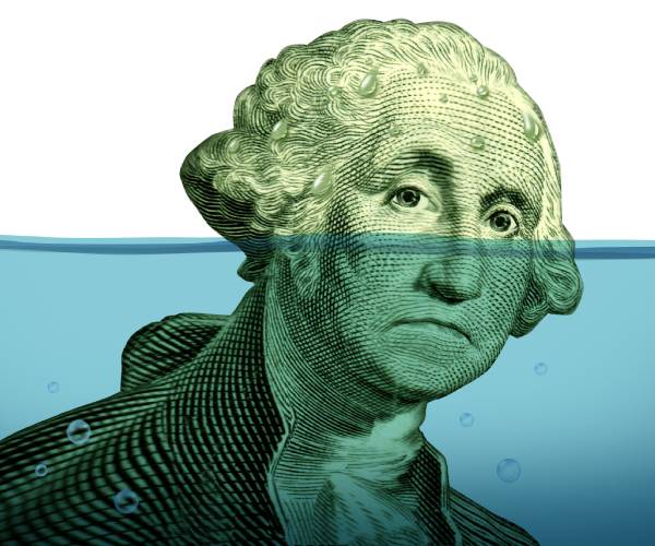 george washington's portrait from the dollar bill shown sinking below water