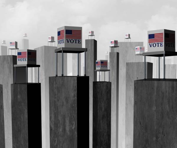 voting booths on top of tall slate towers