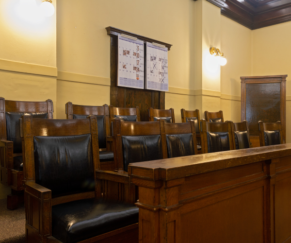 a jury box with empty seats