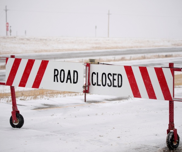 a closed gate on an onramp