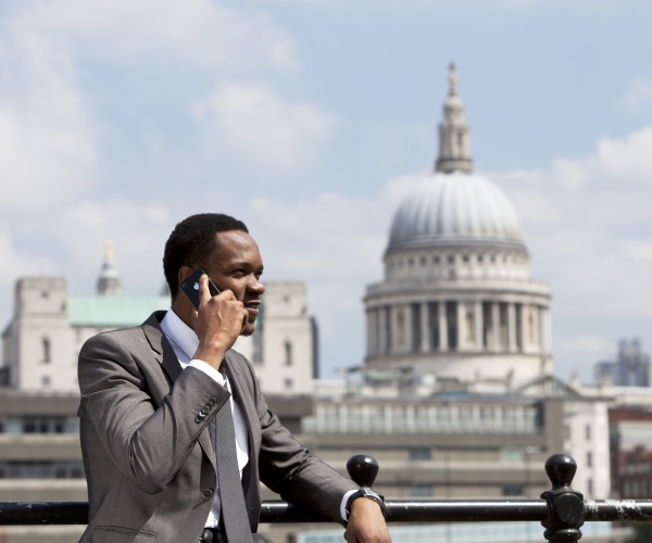 businessman on cell phone outside