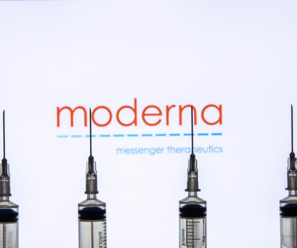 Moderna logo and syringes