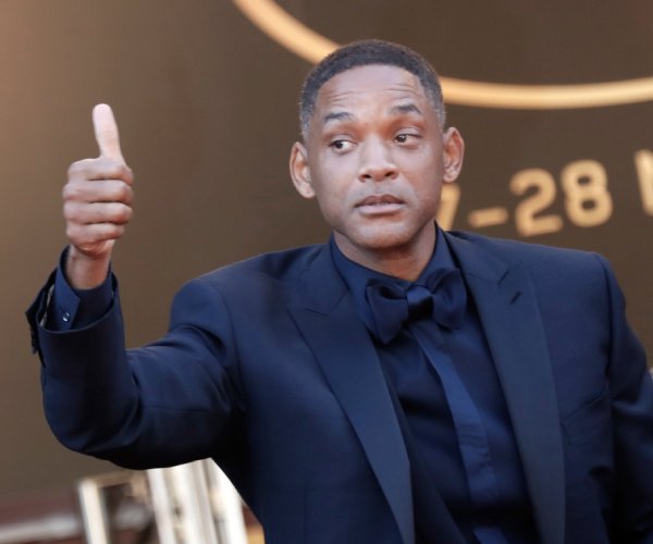 will smith giving a thumbs-up