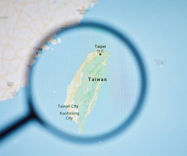 map with taiwan under a magnifying glass