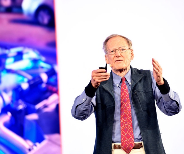  george gilder speaks on stage 