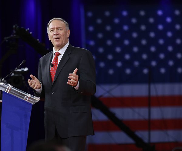 mike pompeo on a stage behind a podium