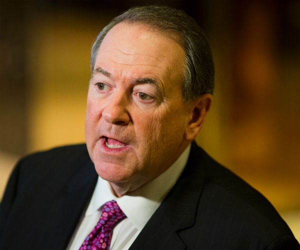 mike huckabee raises his left eyebrow while making comments