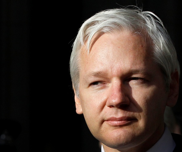 julian assange looks on