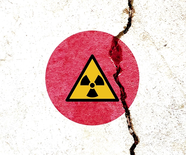 cracked japanese flag with a nuclear symbol on it