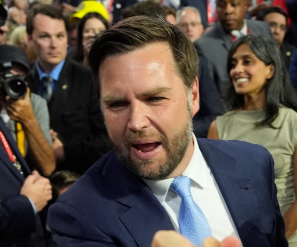 jd vance talks with people around him