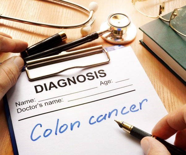 doctor's diagnosis pad says 'colon cancer'