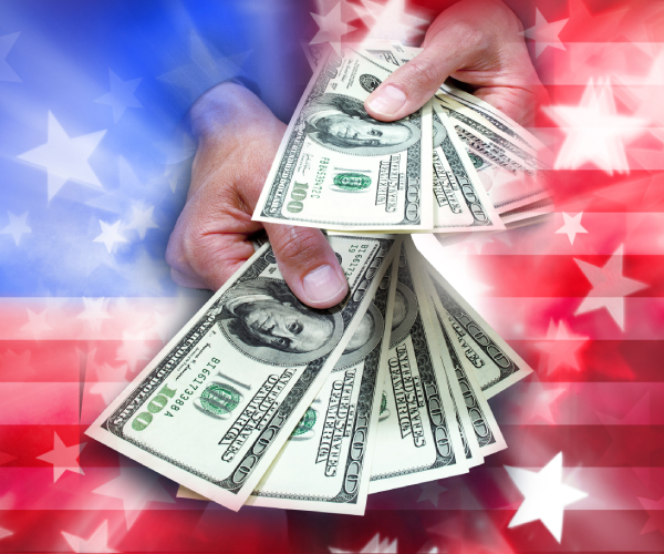 hands holding cash with american flag themed background