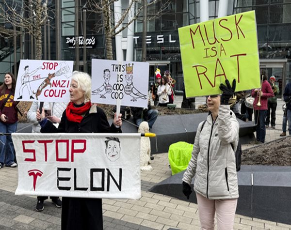 Anti-DOGE Protests at Tesla Stores Target Elon Musk's Bottom Line