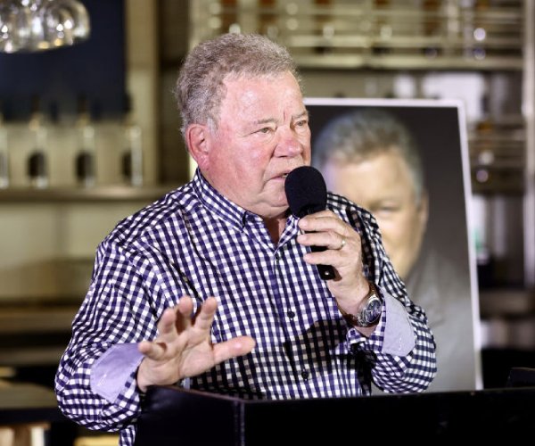 william shatner speaks at a ceremony